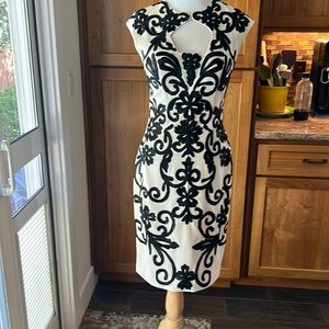 Beautiful Sue Wong dress worn twice. Cream with black appliqué